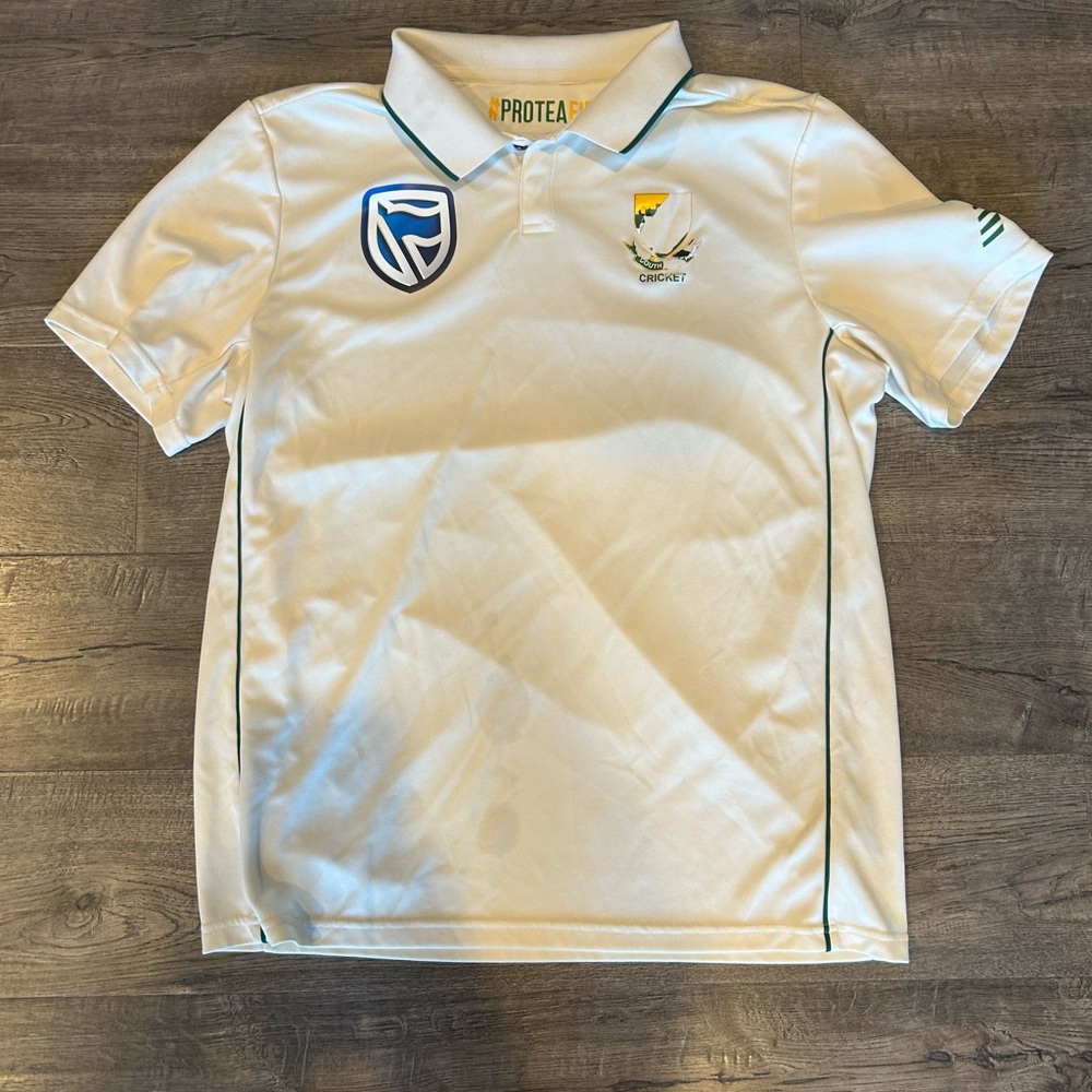 New Balance Vintage Cream Polo Shirt with Embroidered Details